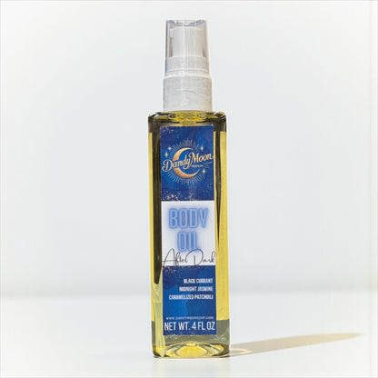 Bottle of Dandy Moon body oil on a white background