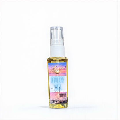 Bottle of body oil called Tan Lines with colorful label on a white background