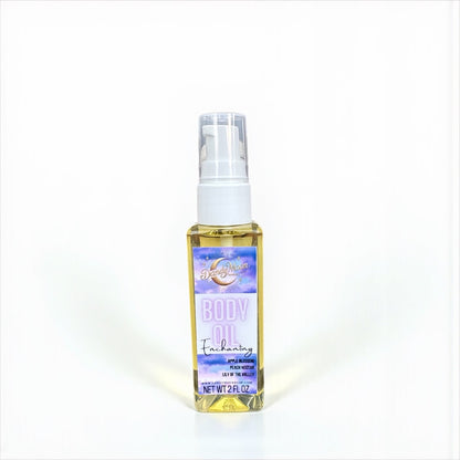 a 2 ounce bottle of body oil sitting on a white surface against a white background
