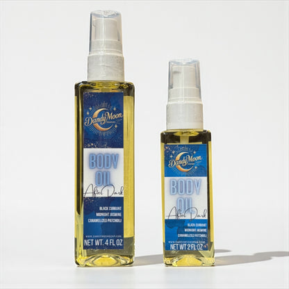 Two bottles of Dandy Moon body oil, one is 2 ounces and one is 4 ounces, on a white background 