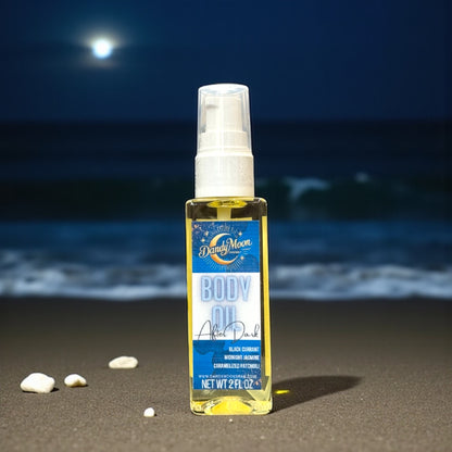 Bottle of body oil with a label on a beach at night with the moon shining in the background and waves crashing on the beach behind the bottle